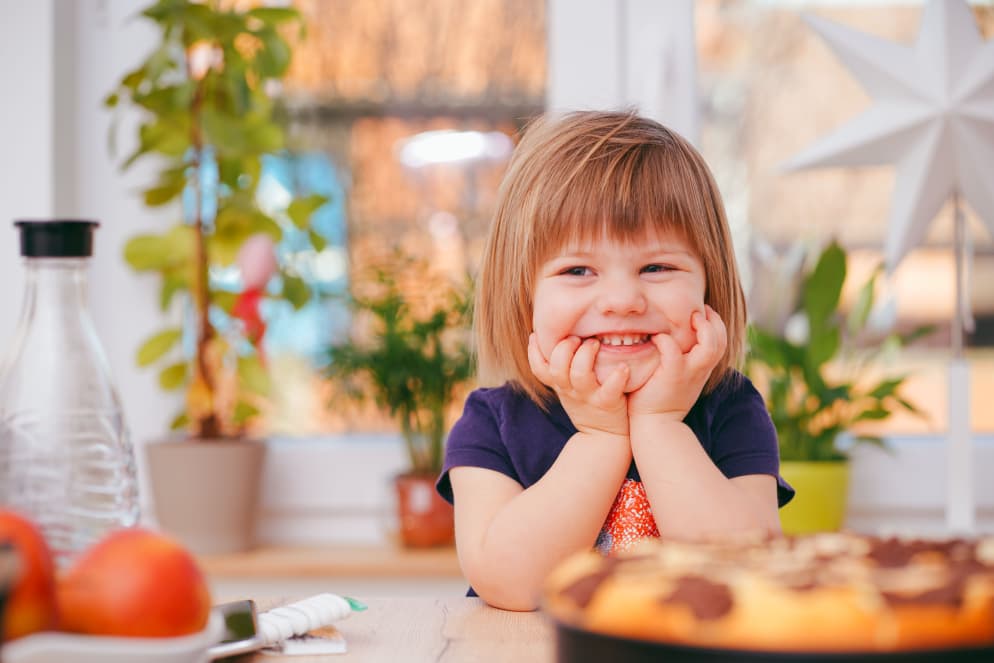 Smiling child wearing warm clothing