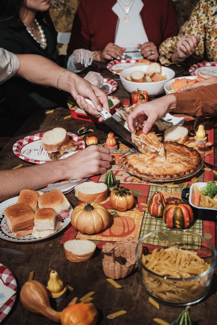 A table laden with holiday food boxes